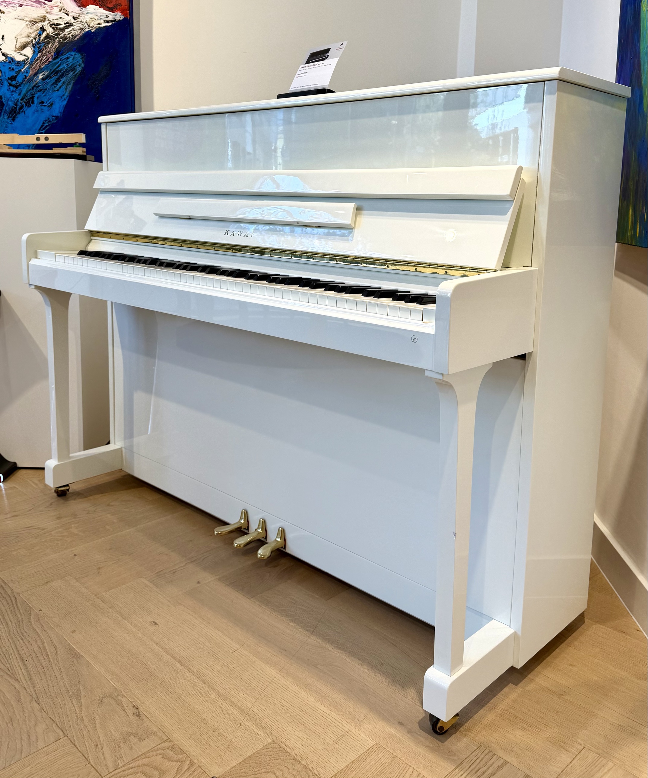 Kawai Klavier CS11N weiß poliert, Seitenansicht mit Tastatur, gebraucht, Pianohaus van Bremen Dortmund